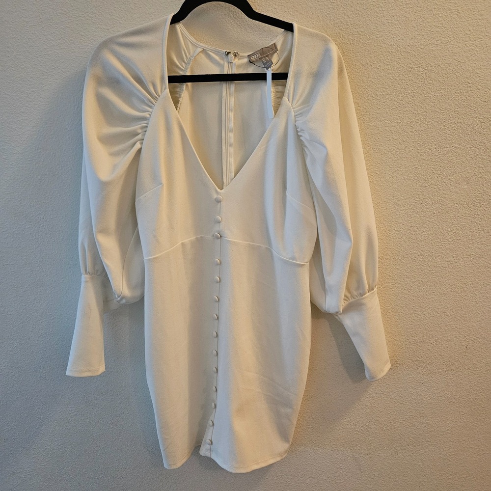 ASOS White puff sleeve mini dress with a deep V-neckline and button details US8